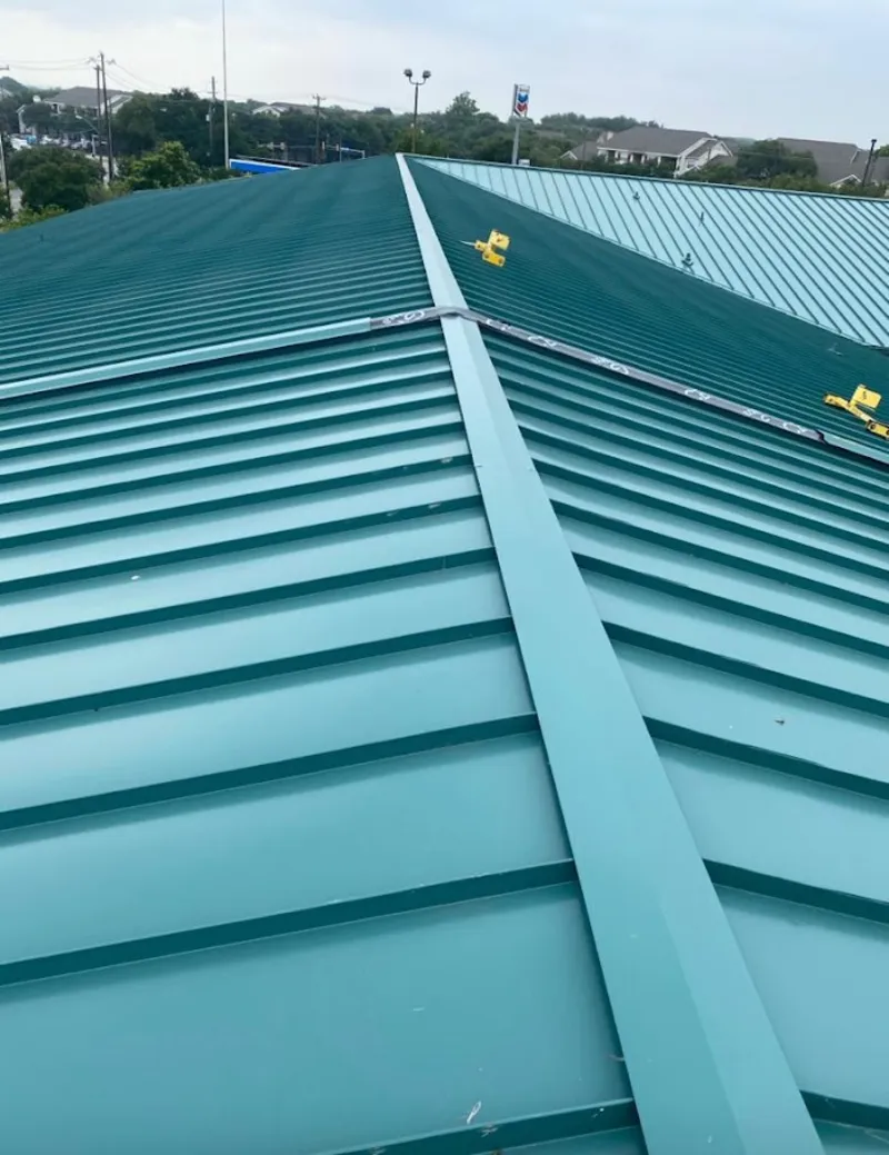 Green commercial metal roof ridge and valley for Metal Roof Repair in Kingston
